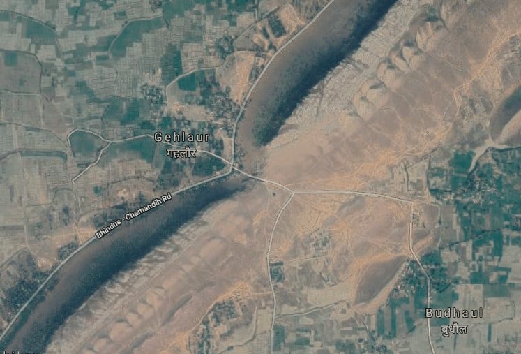 Google Earth view showing Gehlaur, India and the road that cuts through the mountain to get there.